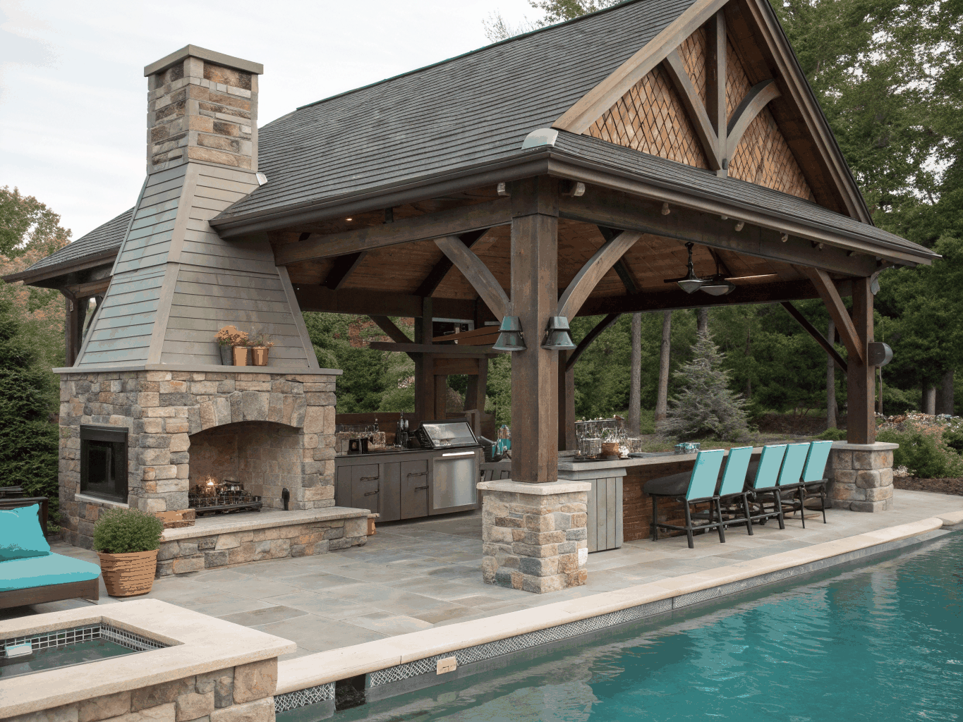 High-end poolside timber lounge pavilion with outdoor kitchen and changing suite