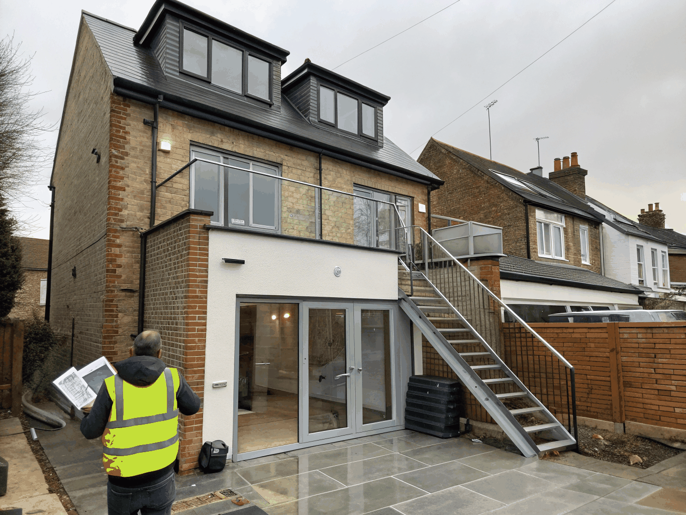 Bright finished dormer loft conversion and rear glass extension structure